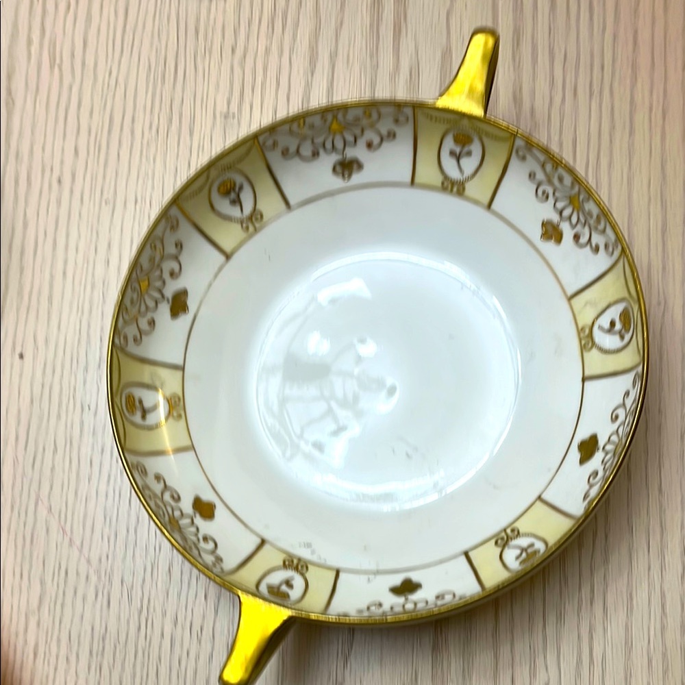 NIPPON HAND PAINTED is stamped on back. Gold and White Serving Bowl 8 1/2” wide.